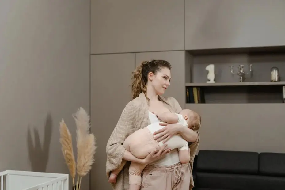 mom holding baby, breast feeding