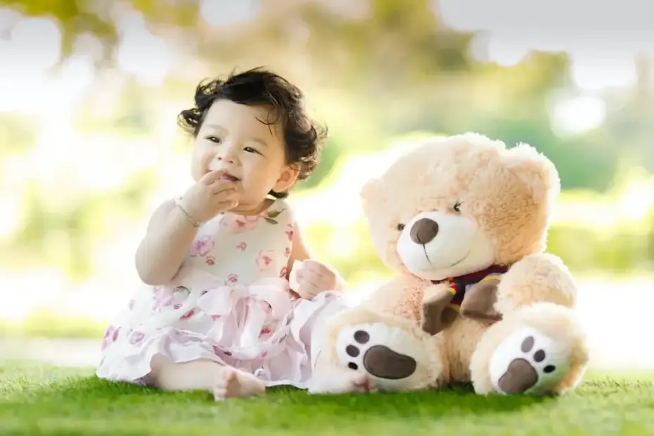 happy baby eating organic baby food and drinking infant formula