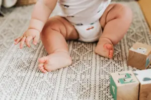 healthy baby playing